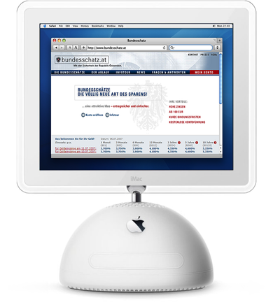Ein alter iMac G4 computer auf dessen Bildschirm die alte Bundesschatz-Webseite dargestellt ist.